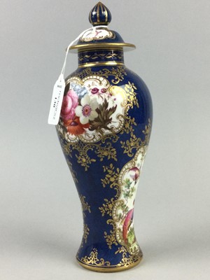 Lot 586 - A STAFFORDSHIRE BALUSTER VASE AND COVER