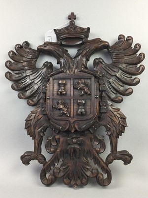Lot 117 - A CARVED WOOD COAT OF ARMS