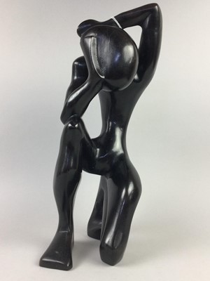 Lot 112 - A LARGE EBONISED CARVED WOOD FIGURE AFTER 'THE THINKER'