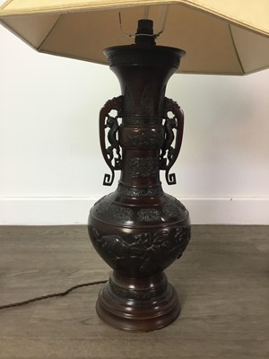 Lot 1050 - A PAIR OF JAPANESE BRONZE VASE LAMPS