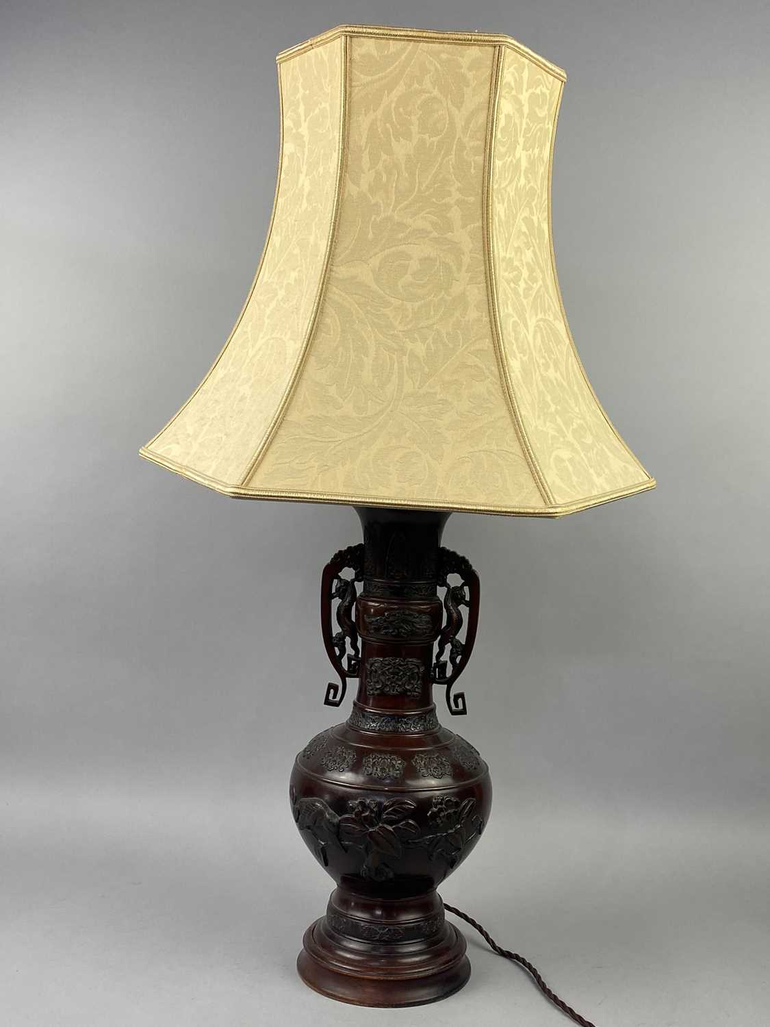 Lot 1050 - A PAIR OF JAPANESE BRONZE VASE LAMPS