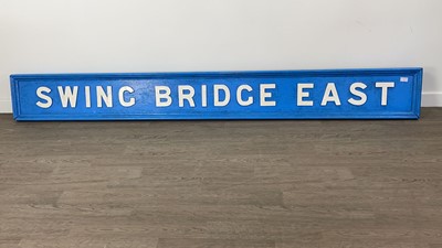 Lot 931A - A LARGE SWING BRIDGE EAST WOODEN SIGN