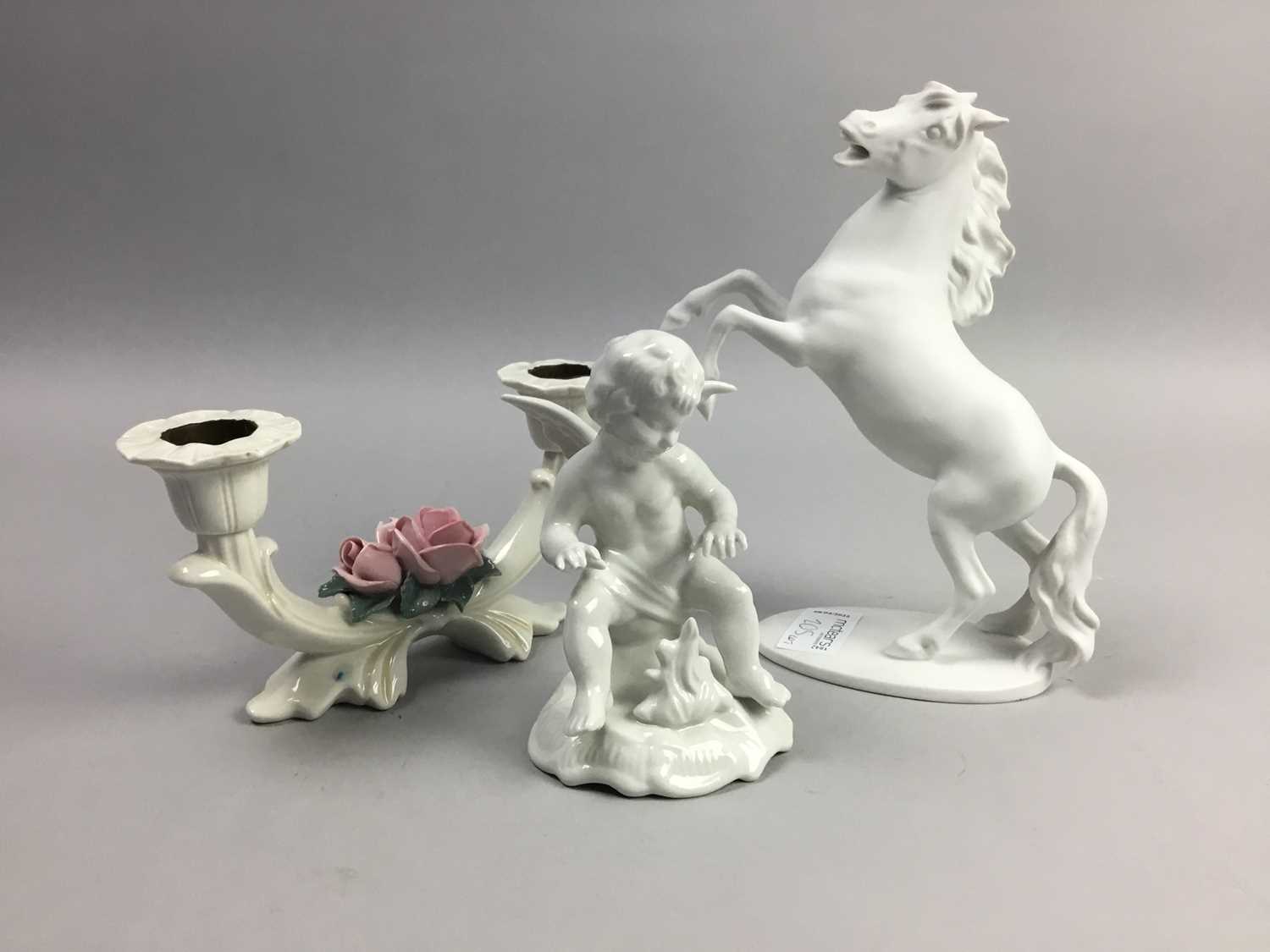 Lot 205 - A SET OF FOUR GERMAN BLANC DE CHINE TYPE CHERUB FIGURES AND OTHER CERAMICS