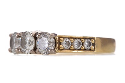 Lot 706 - A DIAMOND THREE STONE RING
