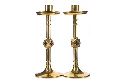 Lot 291 - A PAIR OF GOTHIC REFORM ECCLESIASTICAL CANDLESTICKS