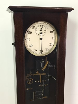 Lot 667 - AN EARLY 20TH CENTURY ELECTROMAGNETIC WALL CLOCK