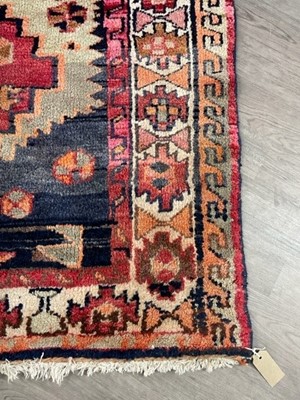 Lot 311 - A BOKHARA STYLE RUG