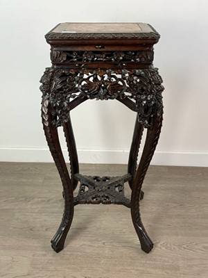 Lot 1055 - A CHINESE PADOUK JARDINIERE STAND