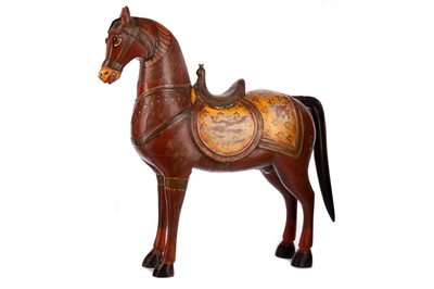 Lot 1053 - AN INDIAN HAND CARVED AND PAINTED WOODEN HORSE SCULPTURE