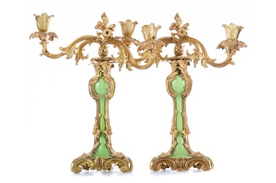 Lot 702 - A PAIR OF LATE 19TH/ EARLY 20TH CENTURY GILT METAL TWIN BRANCH CANDELABRA