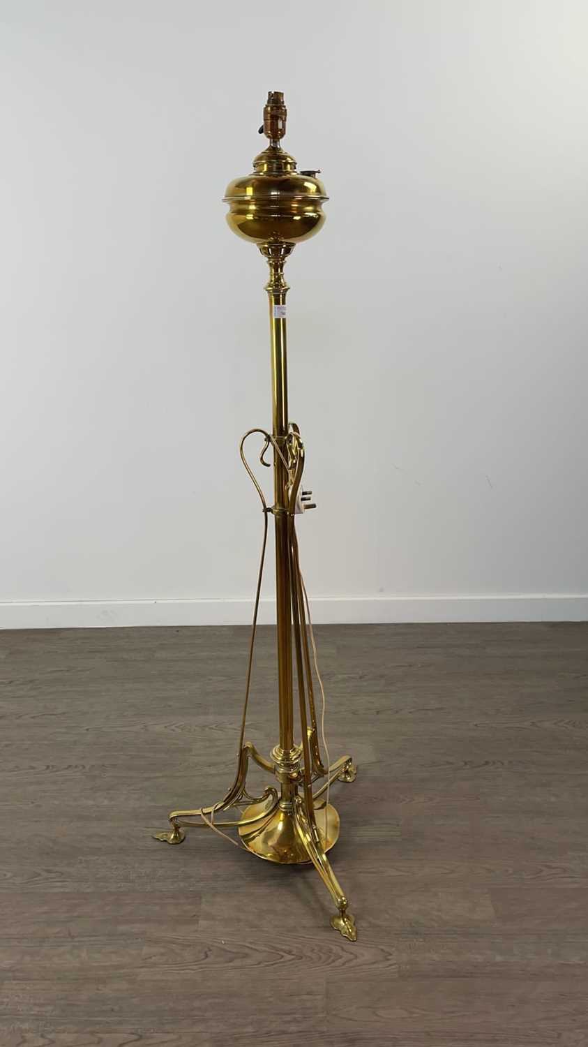 Lot 700 - AN ART NOUVEAU PARAFFIN BRASS STANDARD LAMP