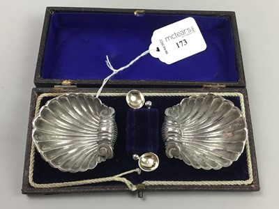 Lot 173 - A PAIR OF SILVER SHELL FORM SALT CELLARS