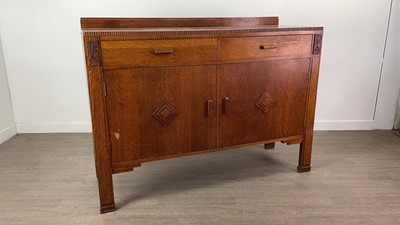 Lot 349 - AN OAK SIDEBOARD AND A DRESSING CHEST