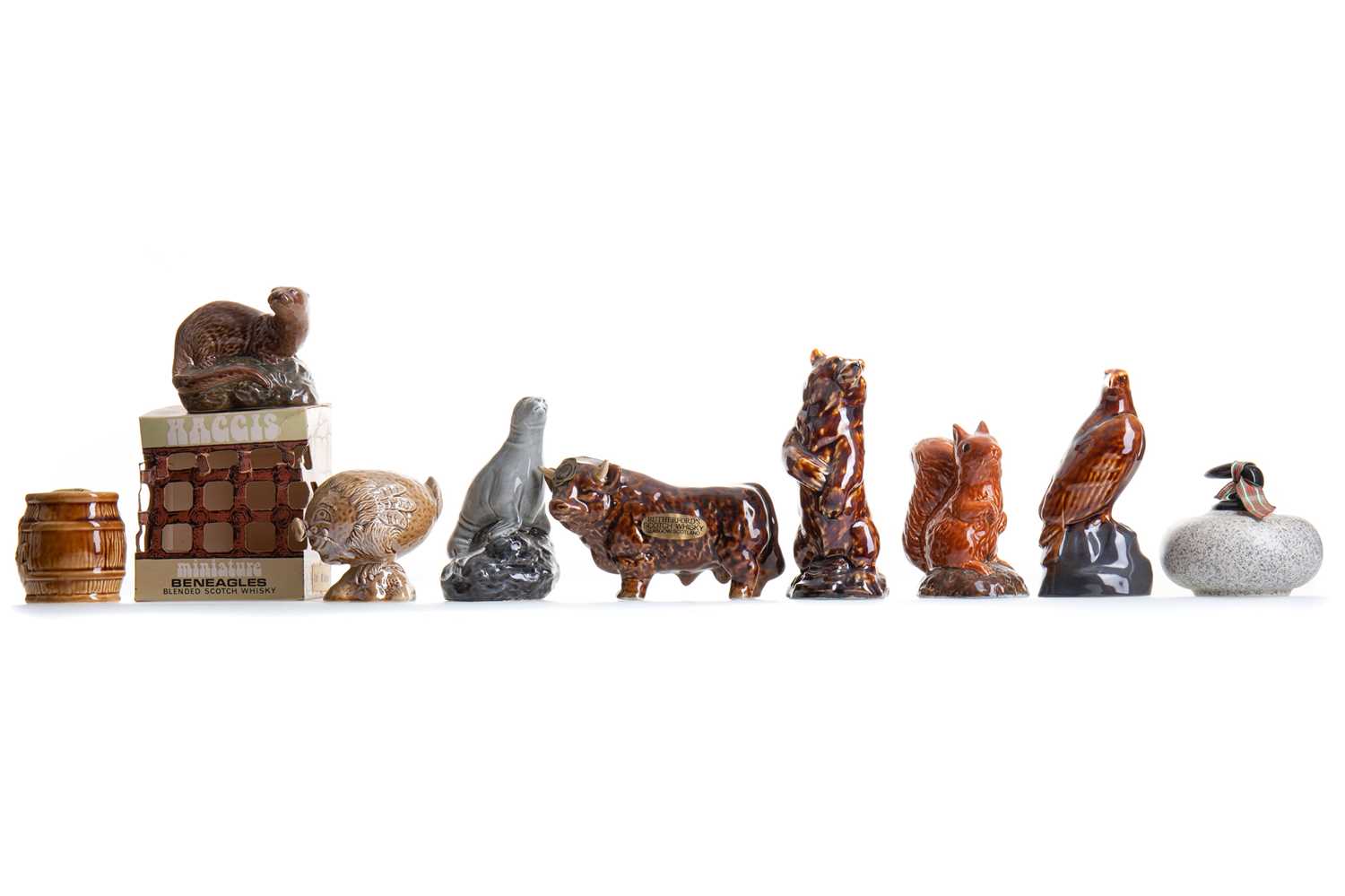 Lot 47 - 11 NOVELTY WHISKY MINIATURES - INCLUDING BENEAGLES CERAMIC SQUIRREL