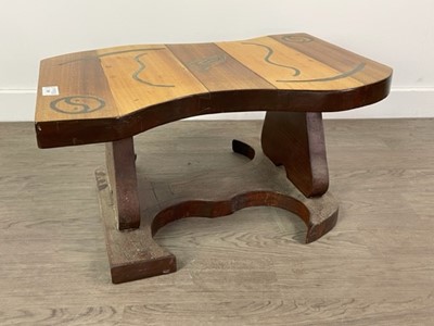 Lot 390 - AN AFRICAN WALNUT TABLE