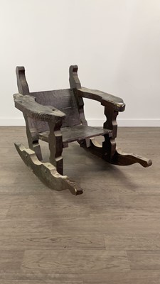 Lot 440 - A BURNT WOOD ROCKING CHAIR