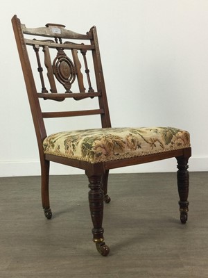 Lot 465 - A VICTORIAN ROSEWOOD NURSING CHAIR