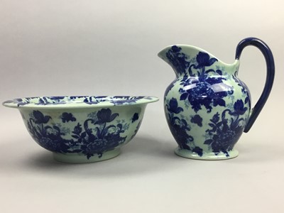 Lot 517 - A REPRODUCTION BLUE AND WHITE EWER AND BASIN