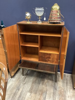 Lot 314 - A MID-20TH CENTURY TEAK DRINKS/RECORD CABINET