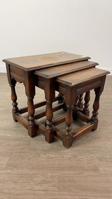 Lot 554 - A NEST OF THREE OAK TABLES