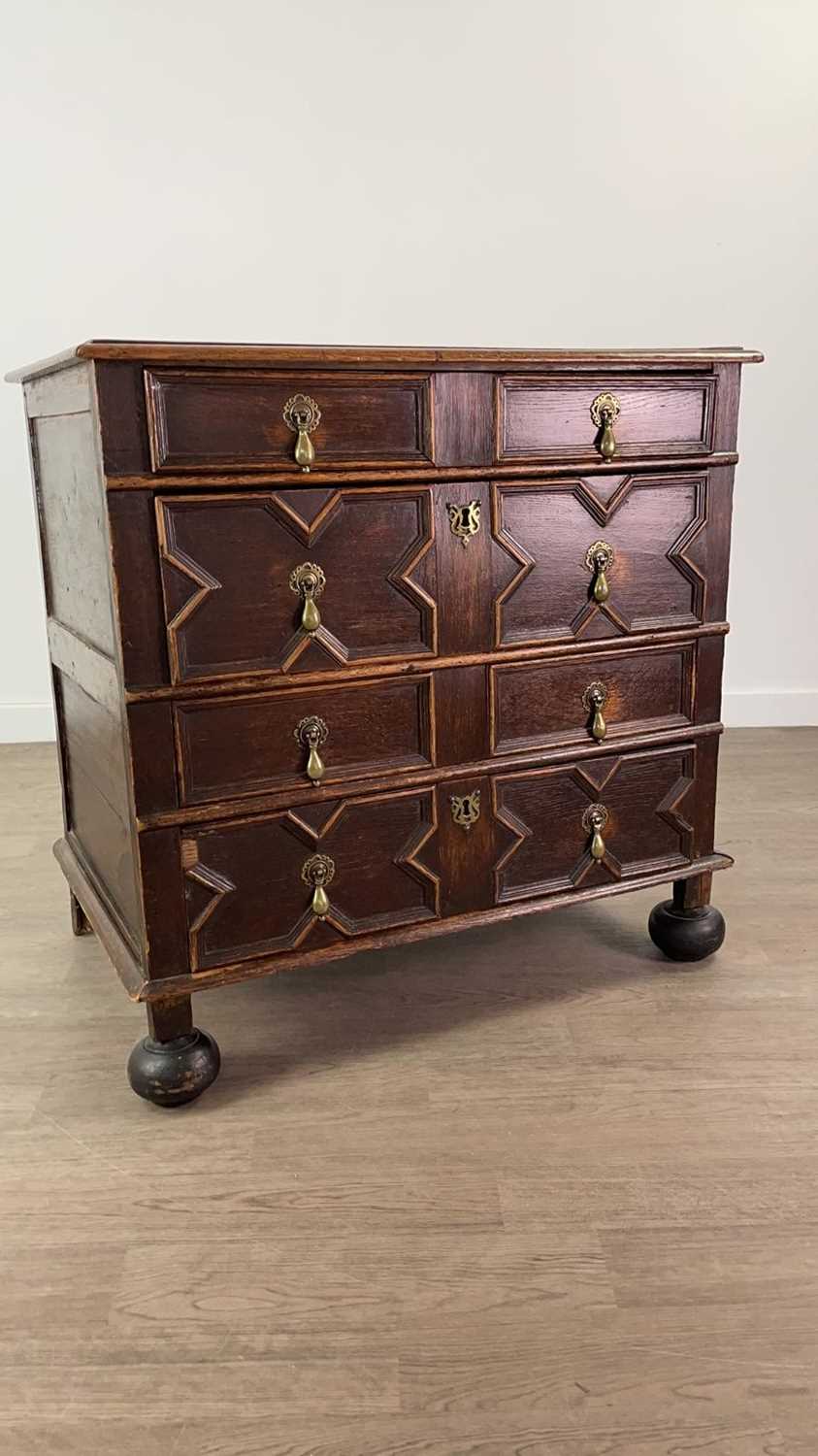 Lot 695 - A CHARLES II OAK CHEST OF FOUR DRAWERS