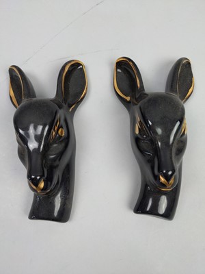 Lot 597 - A PAIR OF WALL MOUNTING CERAMIC DEAR HEADS