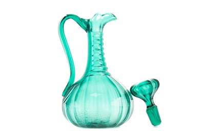 Lot 739 - A LATE 19TH CENTURY GREEN GLASS CLARET JUG