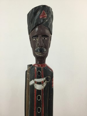Lot 192 - A LARGE CARVED WOOD FIGURE OF A SOLIDER