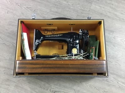 Lot 198 - A SINGER PORTABLE ELECTRIC SEWING MACHINE