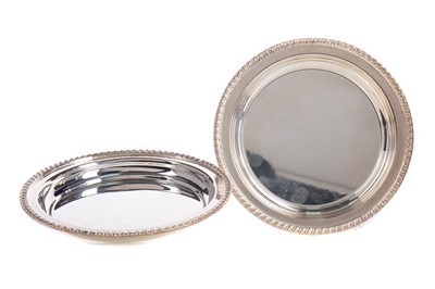 Lot 71 - A PAIR OF SILVER BOTTLE COASTERS