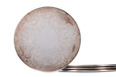 Lot 74 - A SET OF FOUR SILVER PLACEMATS