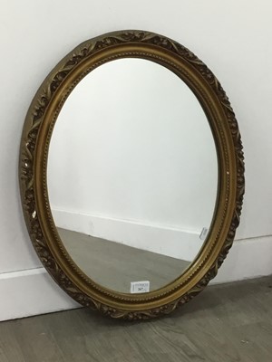 Lot 267 - A GILT FRAMED OVAL WALL MIRROR AND A SMALLER MIRROR