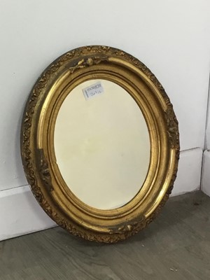 Lot 267 - A GILT FRAMED OVAL WALL MIRROR AND A SMALLER MIRROR