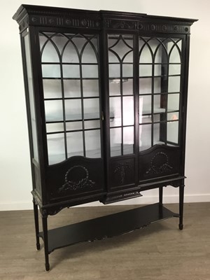 Lot 134 - AN EBONISED FRENCH STYLE DISPLAY CABINET
