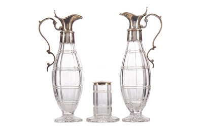 Lot 78 - A PAIR OF VICTORIAN SILVER MOUNTED OIL AND VINEGAR BOTTLES