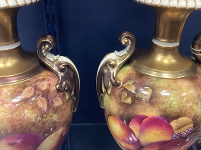 Lot 321 - A PAIR OF ROYAL WORCESTER  DOUBLE HANDLED OVOID VASES