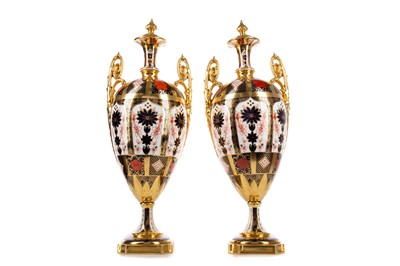 Lot 337 - A PAIR OF ROYAL CROWN DERBY IMARI TWIN-HANDLED VASES WITH COVERS