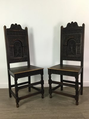 Lot 684 - A PAIR OF 19TH CENTURY EBONISED HALL CHAIRS
