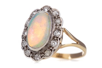 Lot 1236 - A LARGE OPAL AND DIAMOND CLUSTER RING
