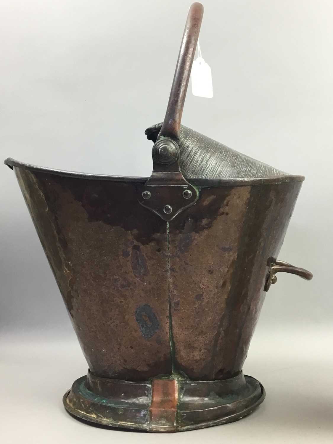 Lot 322 - A COPPER COAL SCUTTLE, SHELL CASING AND FIRE POKER