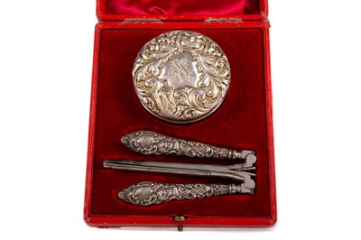 Lot 109 - A VICTORIAN SILVER MOUNTED HAIR CURLING SET