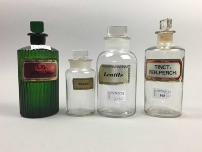 Lot 168 - A LOT OF FIVE CLEAR GLASS APOTHECARIES BOTTLES AND OTHERS