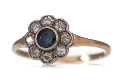 Lot 1251 - A SAPPHIRE AND DIAMOND FLOWER CLUSTER RING