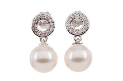 Lot 1150 - A PAIR OF PEARL AND DIAMOND EARRINGS