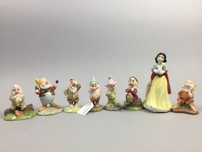 Lot 85 - A GROUP OF ROYAL DOULTON DISNEY SHOWCASE COLLECTION 'SNOW WHITE AND THE SEVEN DWARVES' FIGURES
