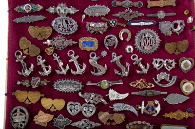 Lot 426 - A BOARD OF SWEETHEART BROOCHES