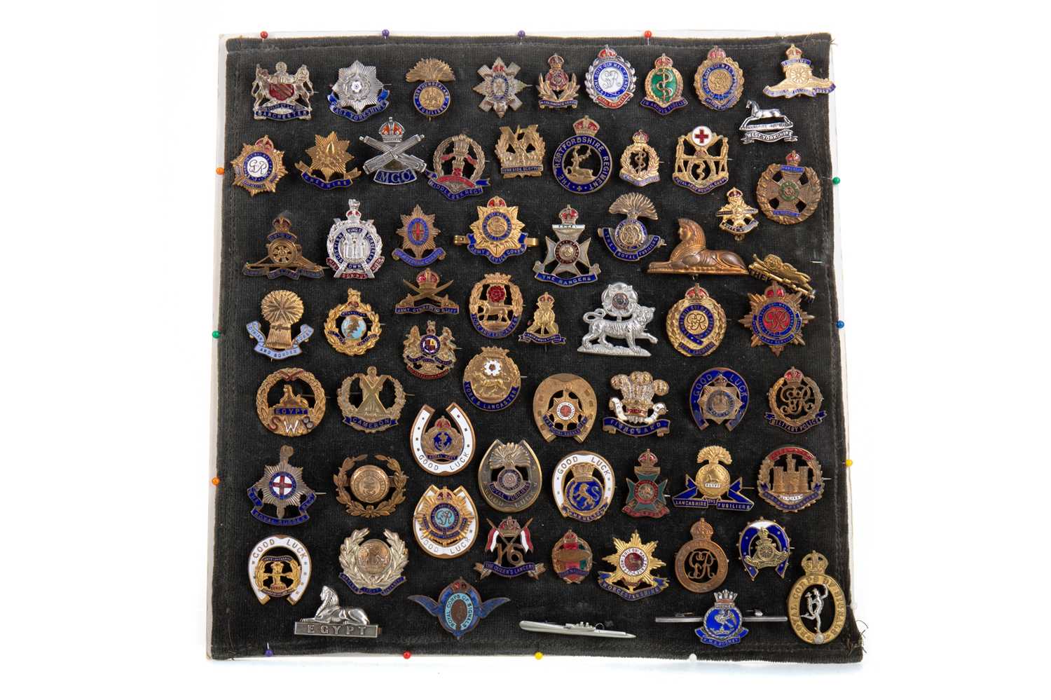 Lot 428 - A BOARD OF CHIEFLY BRITISH REGIMENT BROOCHES