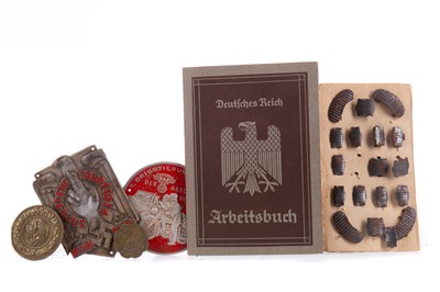 Lot 75 - FOUR BADGES/TOKENS ALONG WITH A BOOKLET AND SHOE STUDS