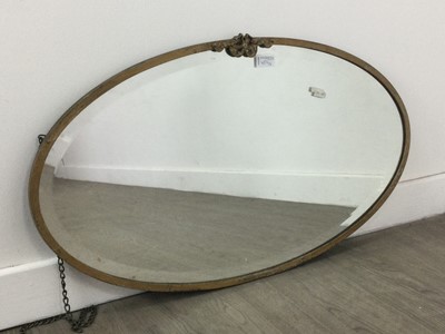 Lot 457 - A LOT OF TWO BRASS FRAMED OVAL WALL MIRRORS