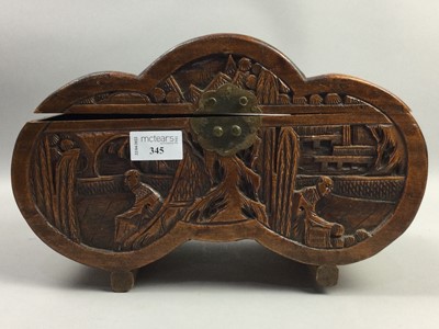 Lot 345 - A CHINESE CARVED WOOD MINIATURE CHEST